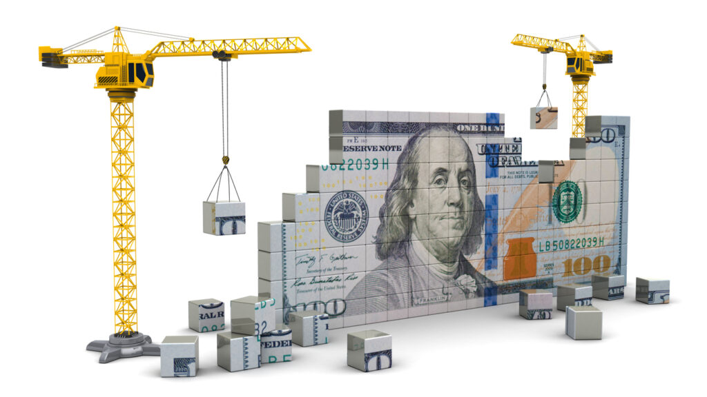 Cranes building money.